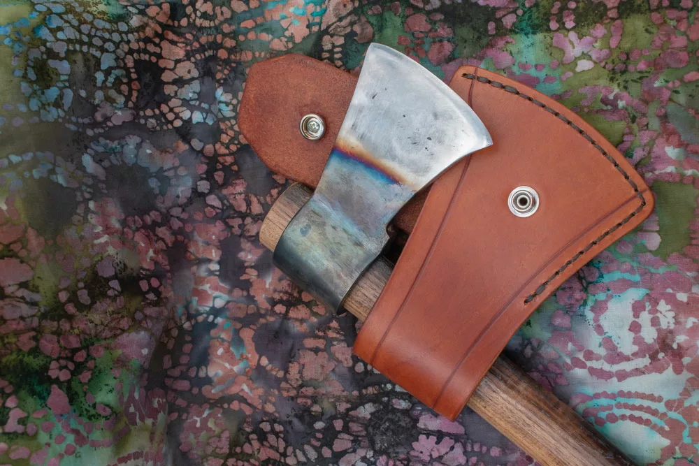 Axe with a leather sheath