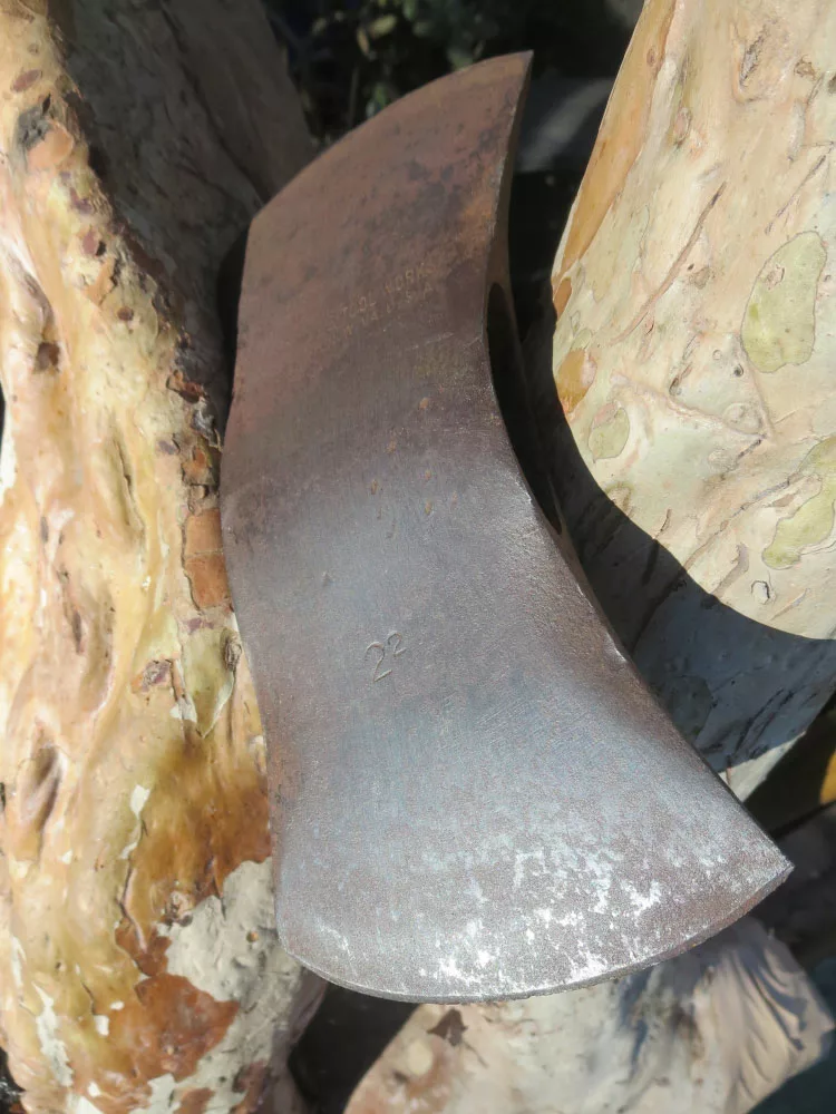 An Old double-bit axe head.
