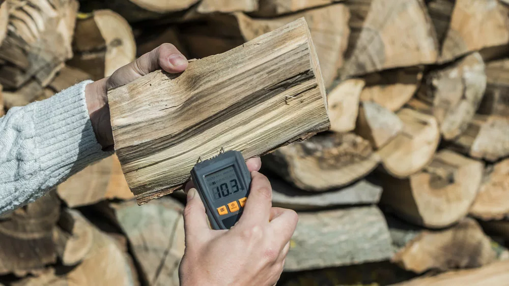 Check the moisture content of firewood
