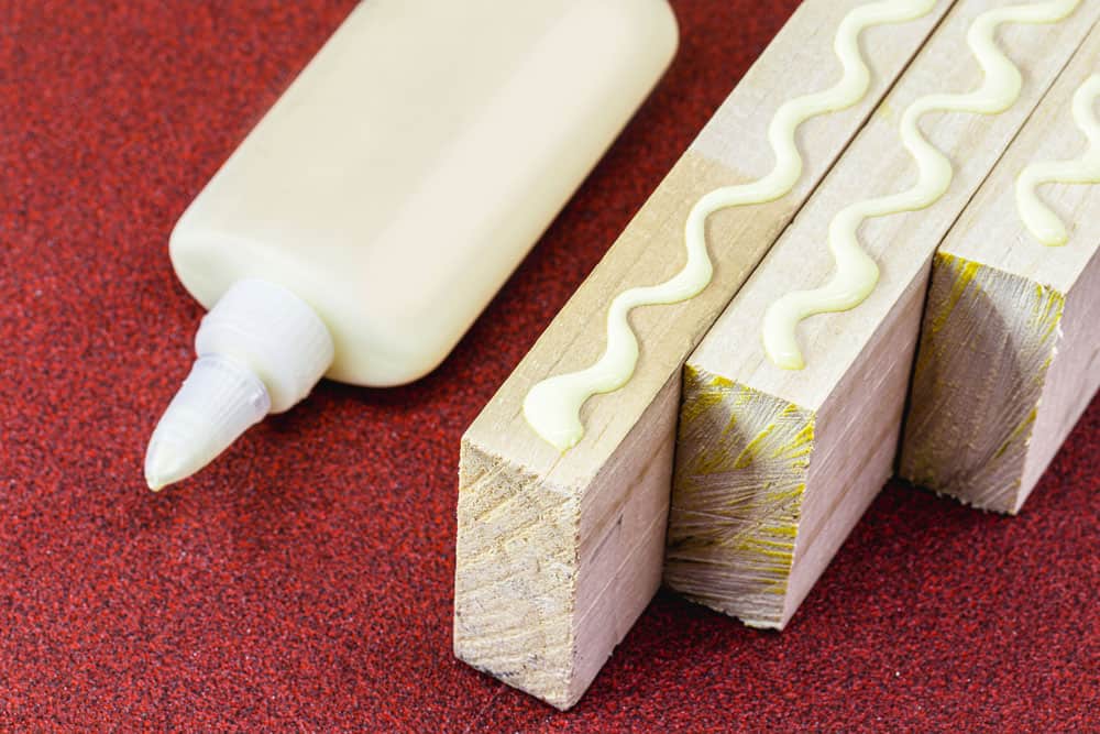 Wood glue sandpaper concept carpentry 
