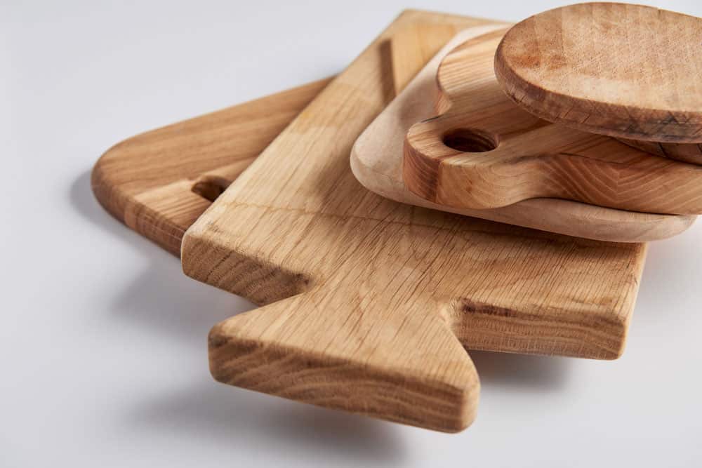 a stack of different cutting boards
